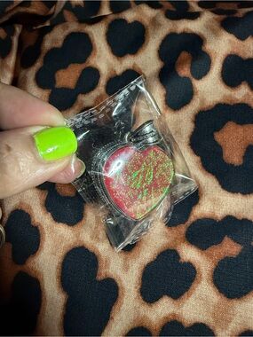 Heart-Shaped Pendant in Red with Green Sparkle